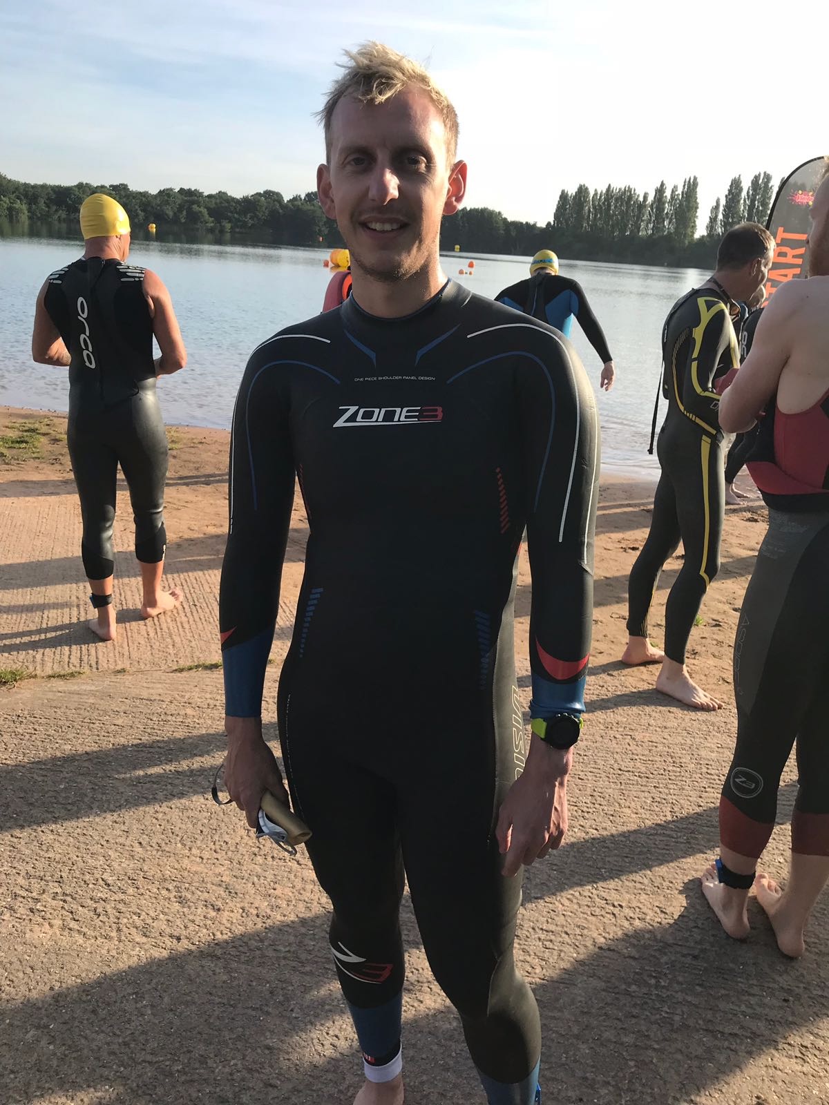 Oliver Saxon in a wetsuit ready for an open water swim